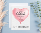 Anniversary card with pink heart balloon design on a light blue background
