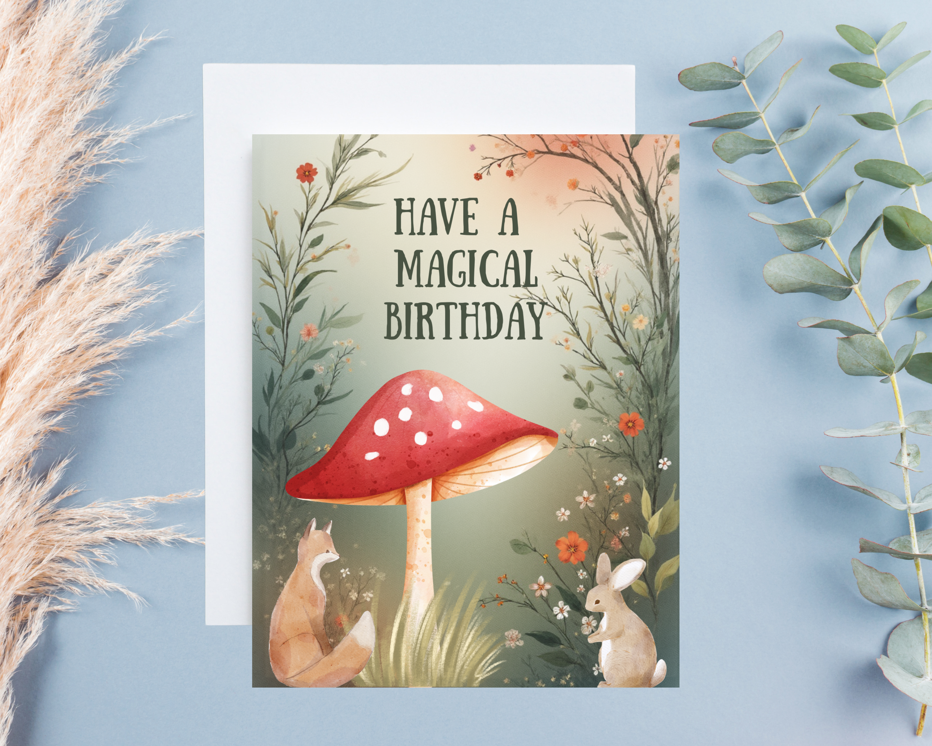 Greeting card with a red mushroom and animals on a blue background