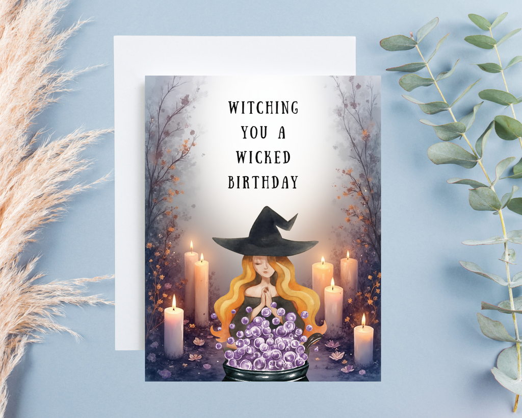 Greeting card with a witch with a bubbling cauldron with text "Witching you a wicked birthday"