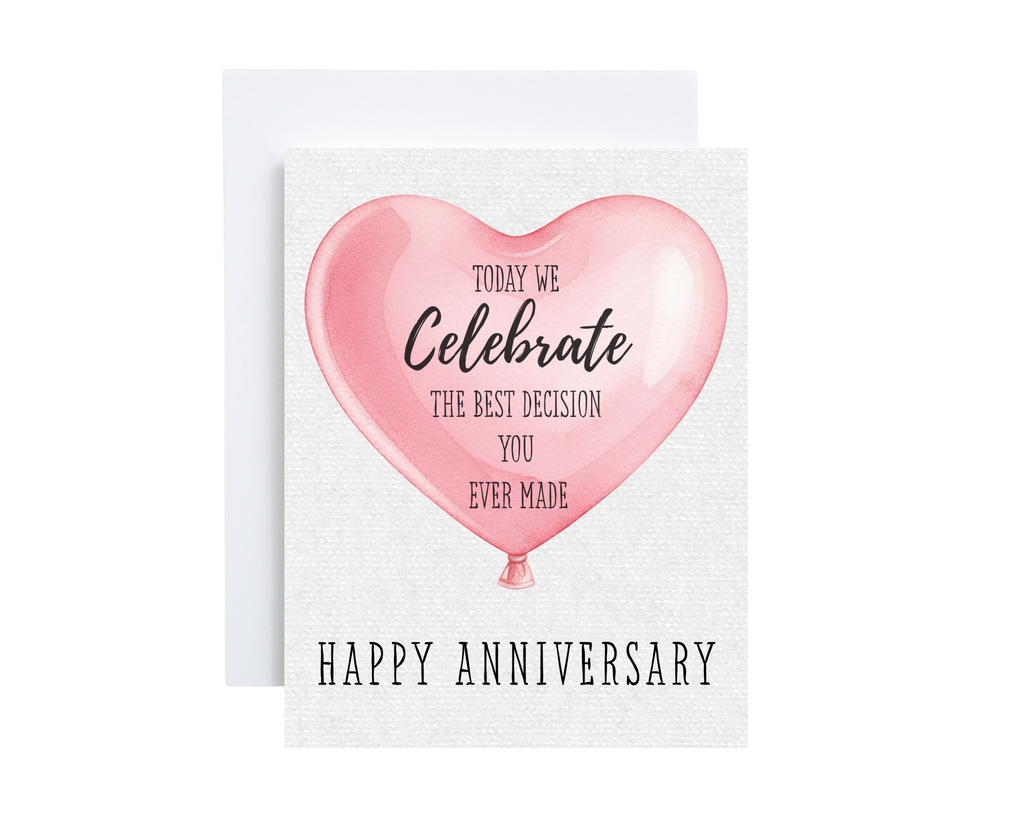 Card with a pink heart balloon and anniversary message on a white background